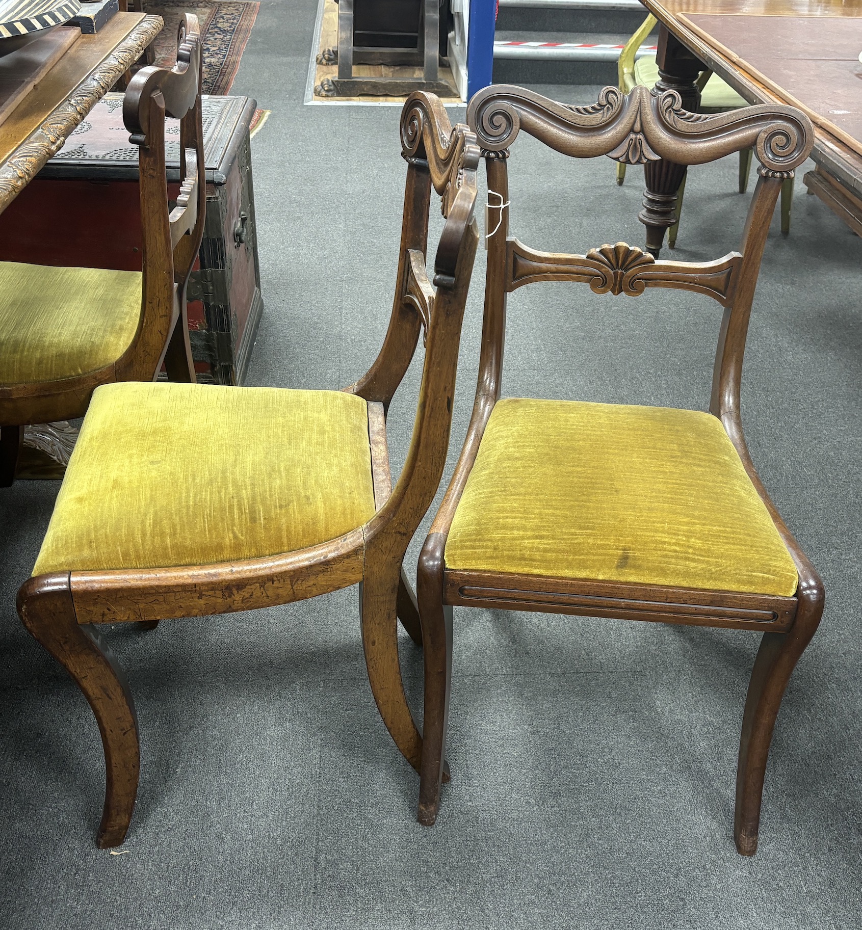 A set of six Regency mahogany sabre leg dining chairs